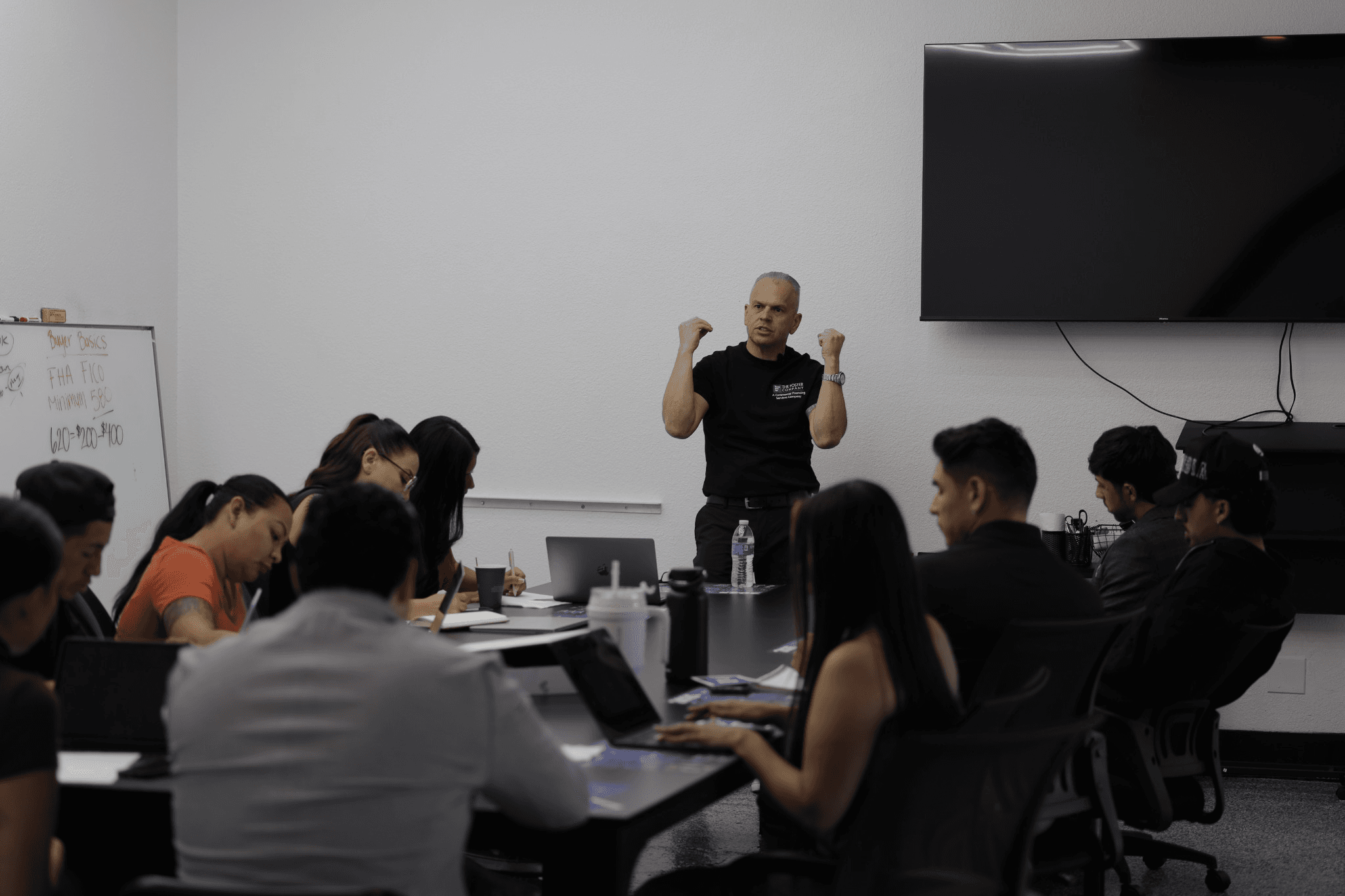 Agents working during a training room session